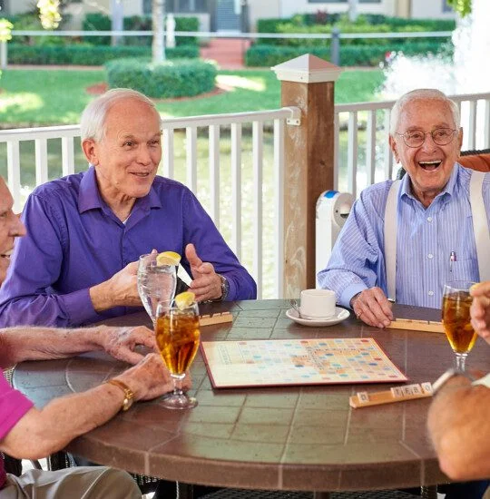 A group of seniors playing scrabble
