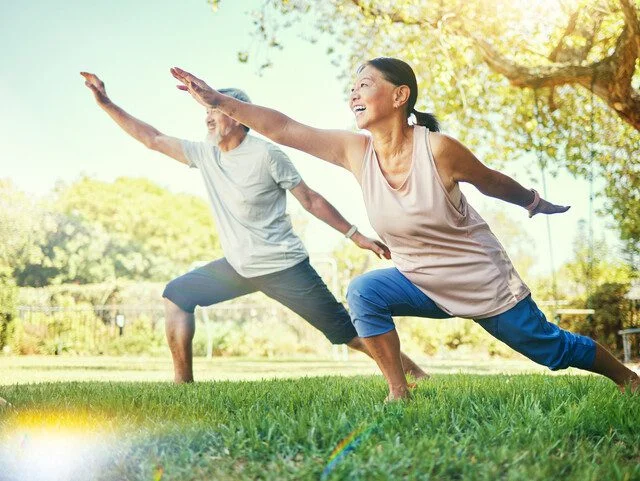 Senior couple, outdoor and yoga for health, fitness and wellness in grass, healthy or happy. Retired, elderly and enjoying retirement with workout, stretching and backyard for body, man and woman