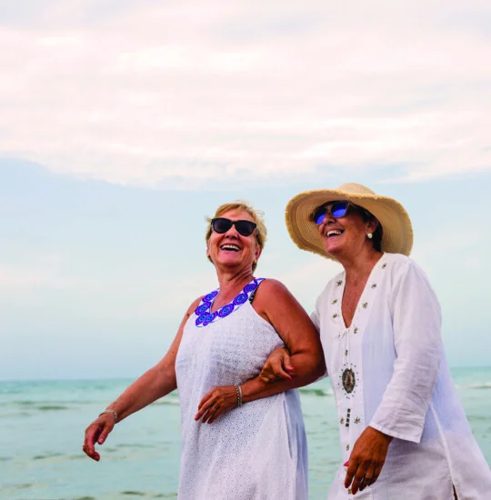 Senior women having fun at the beach