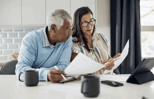 Senior couple making retirement decisions