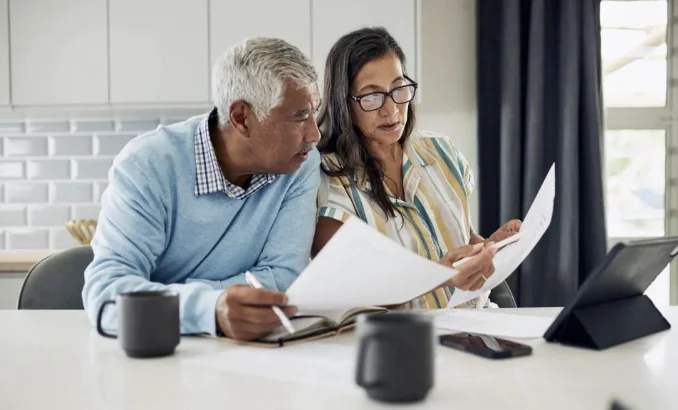 Senior couple making retirement decisions