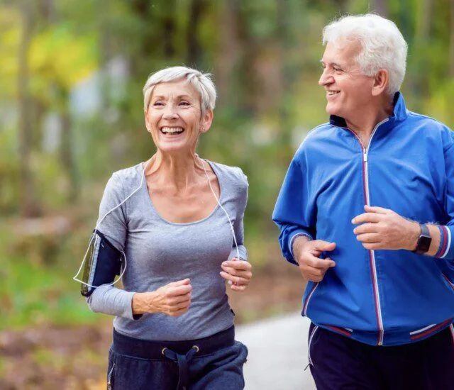 Two seniors enjoying a park in Juno Beach, Florida