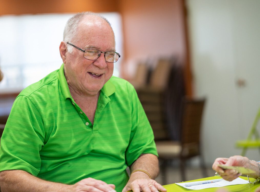 A senior man smiling