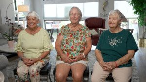 Carol, Beverly, and Janet sitting down and being interviewed