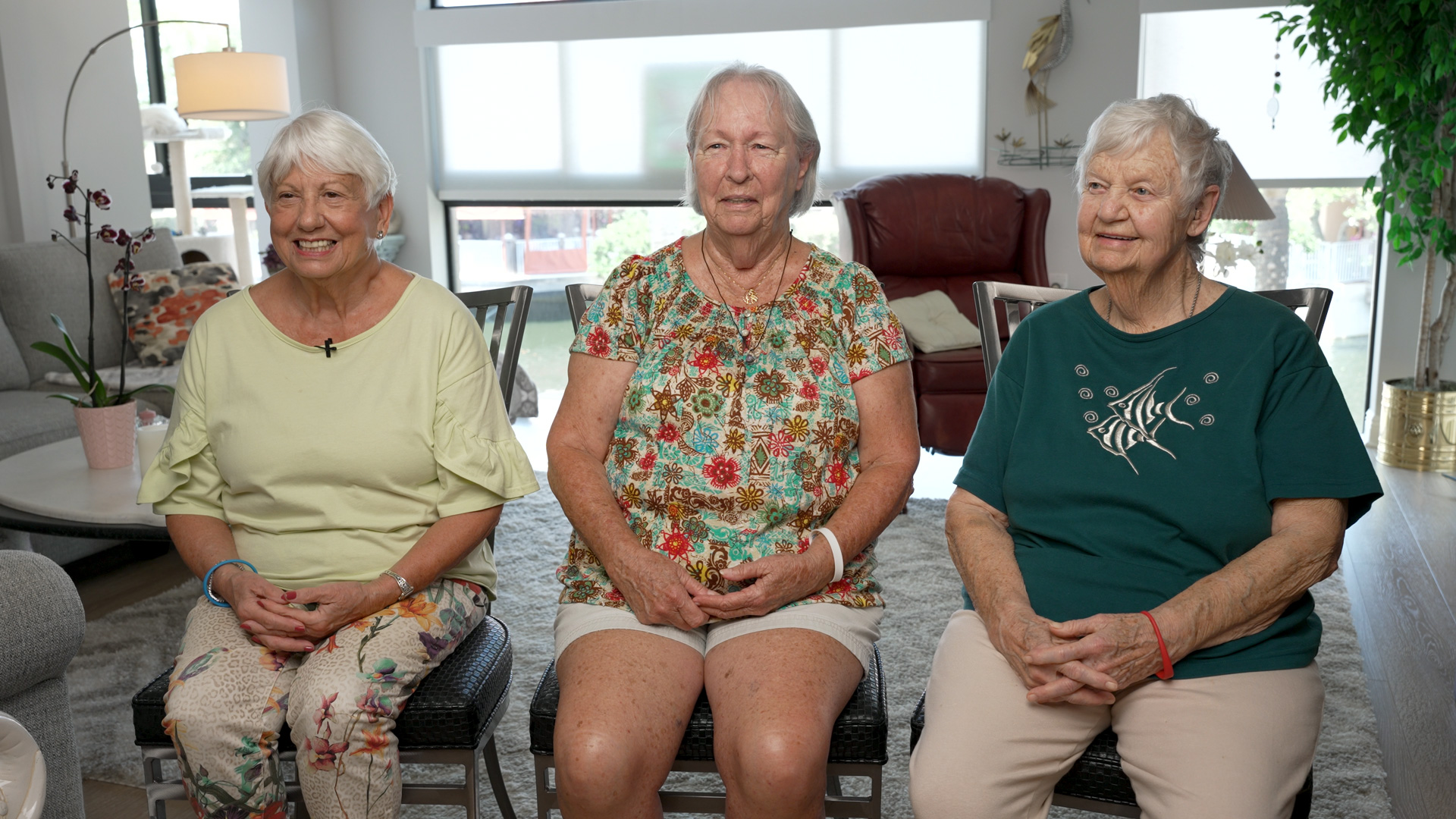 Carol, Beverly, and Janet sitting down and being interviewed